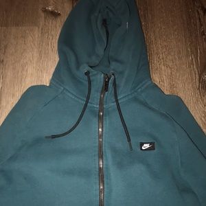 Deep green Nike tech sweatshirt